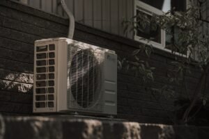 Residential AC unit mounted outdoors