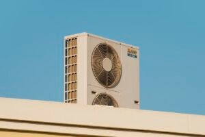 AC unit installed on rooftop of building