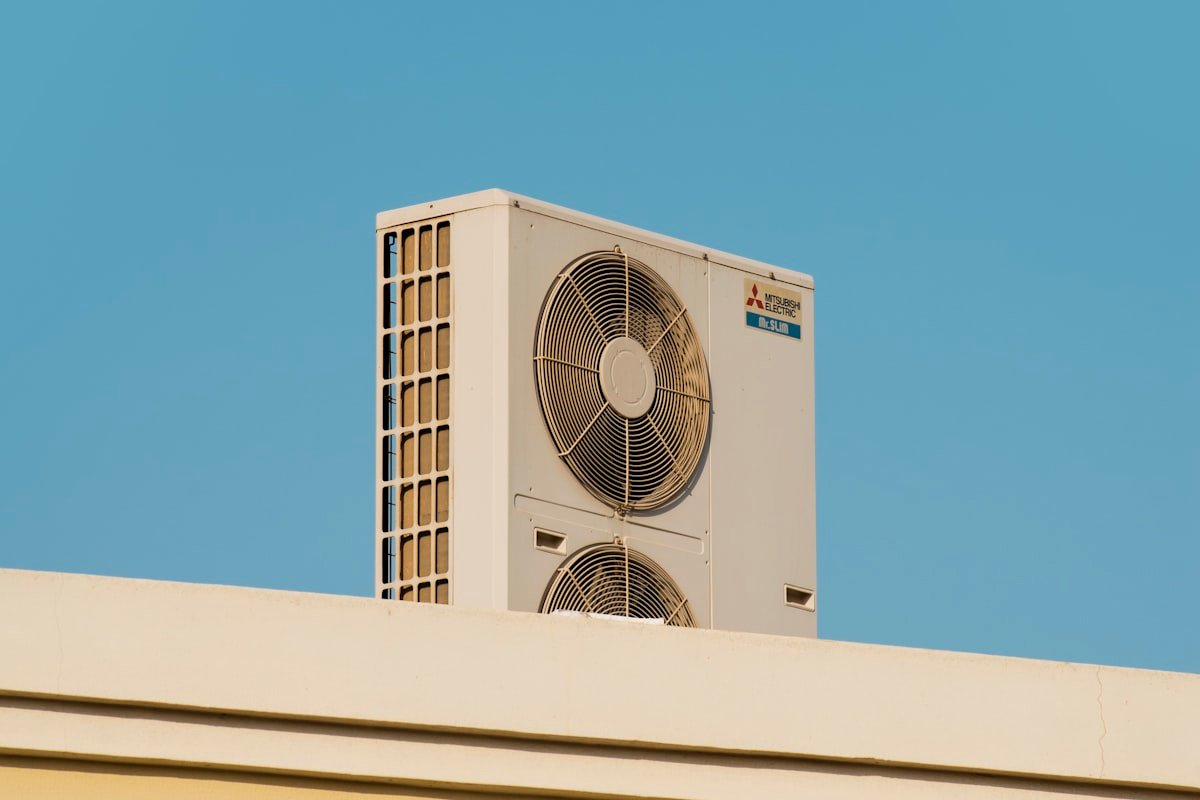 AC unit installed on rooftop of building